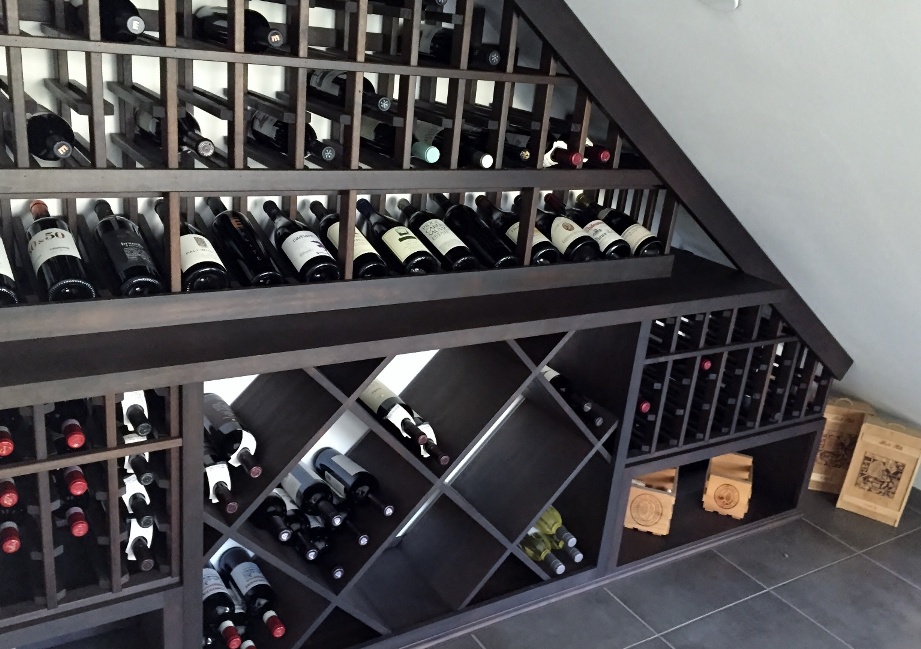 Residential Custom Wine Cellar Under the Stairs Designed by a Trusted Builder in Seattle