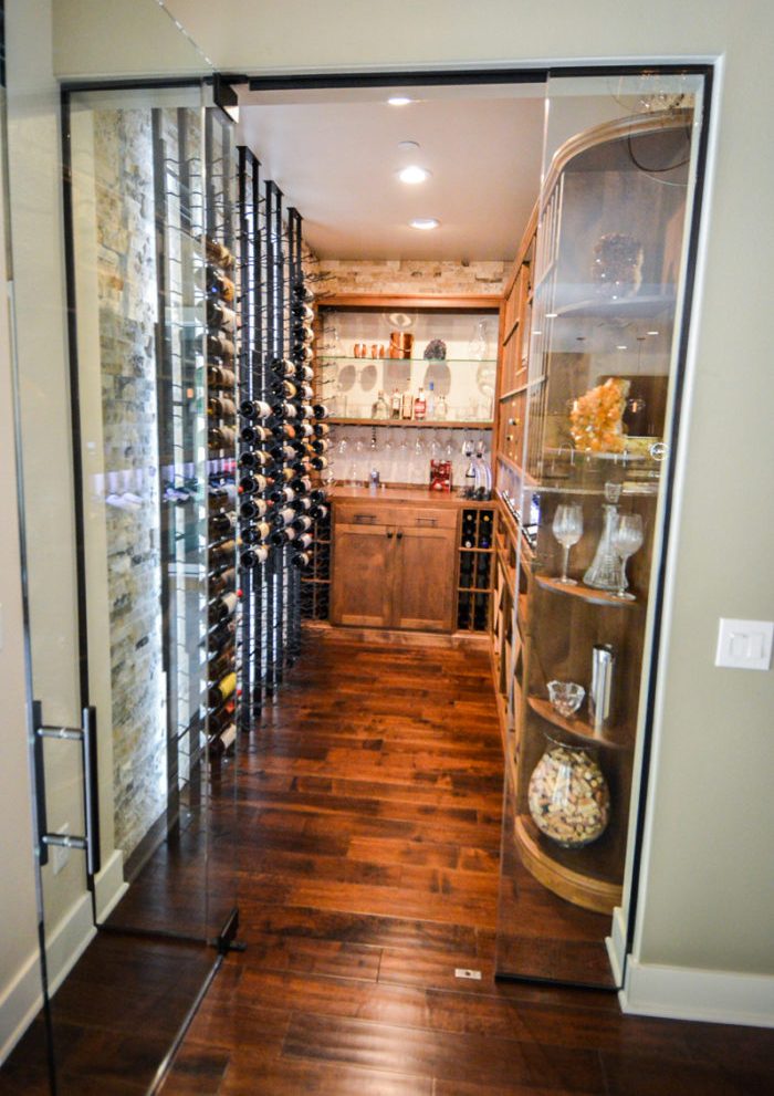 Transitional Residential Custom Wine Cellar in Seattle with Metal and Wood Wine Racks