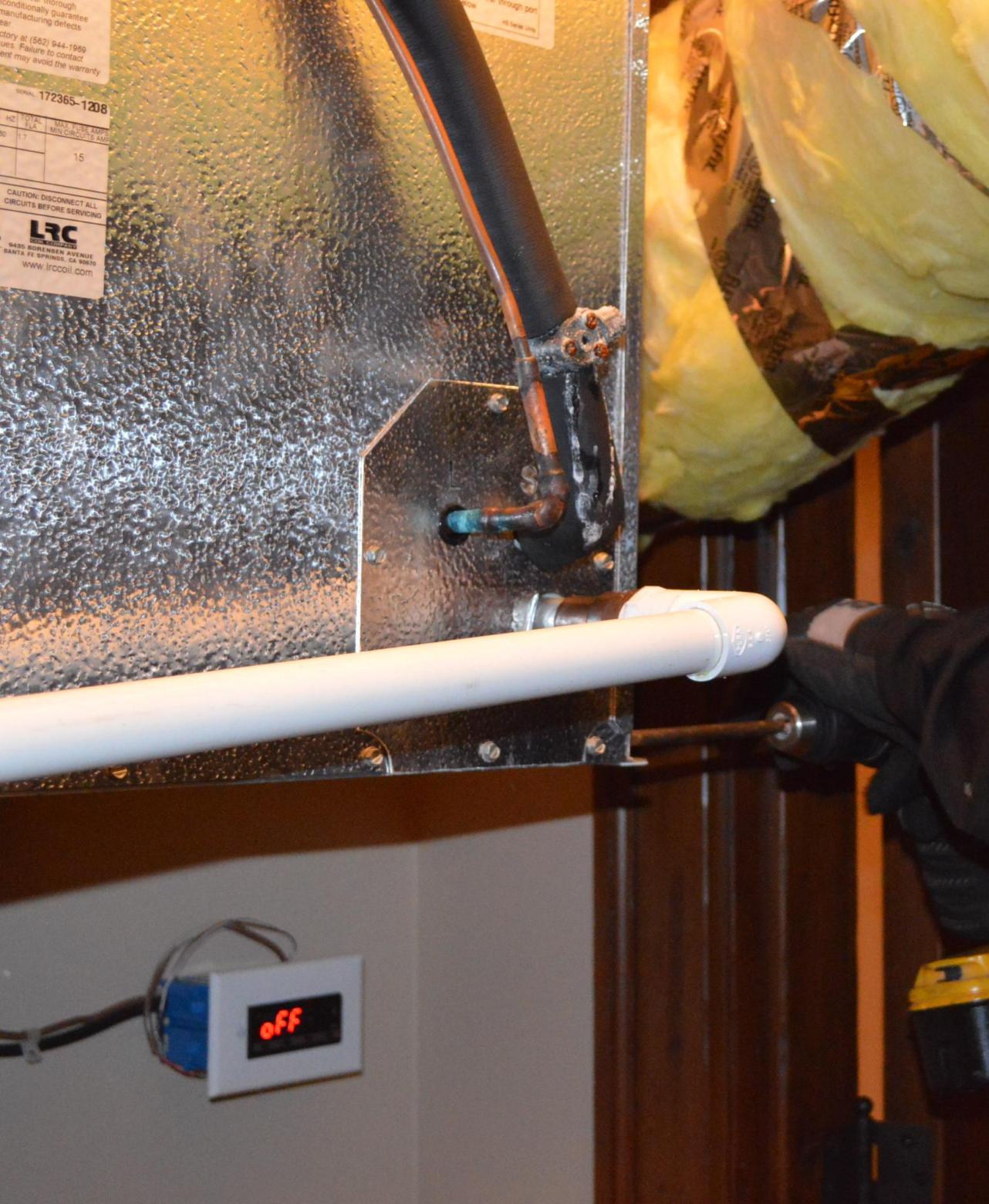 Wine Cellar Cooling Unit Leak Repair by Seattle Builders