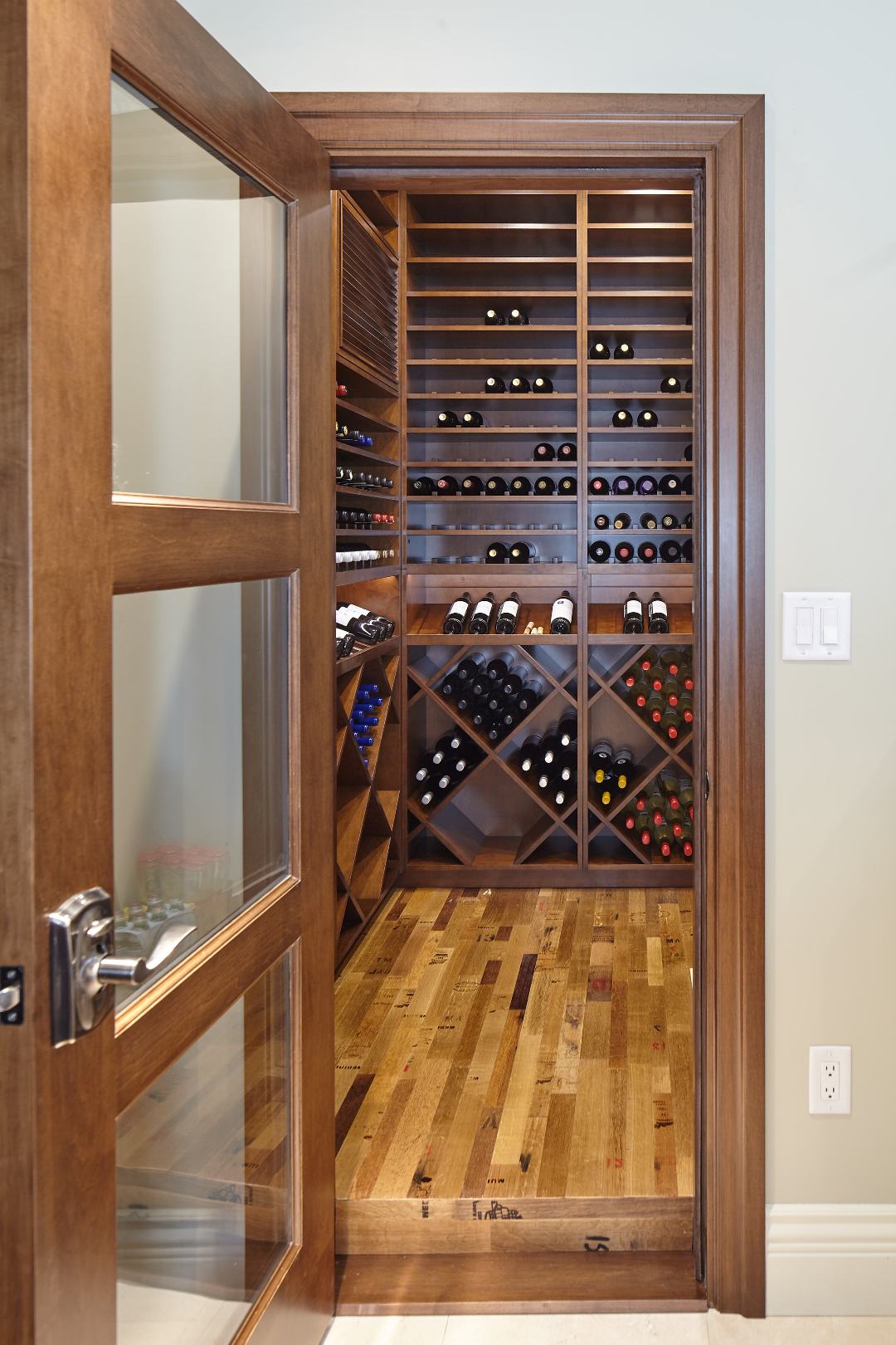 Traditional Residential Custom Wine Cellar in Seattle Imstalled with a Glass Door