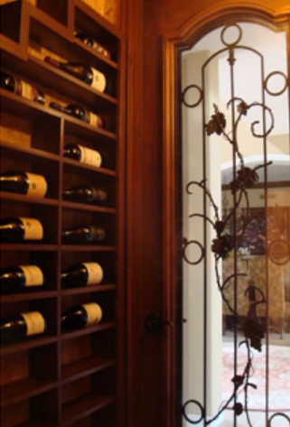 Custom Wine Cellar Under Stairs Installed an Elegant Door