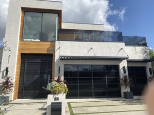Our modern wine racking system fits just right with this modern home. The team constructed the wine cellar within their open dining room, adding more visual appeal to the already stylish area.